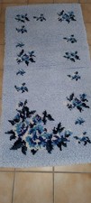 Tapis fait main point noué PINGOUIN état neuf, avec une bordure 