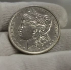 1886  US Morgan Silver Dollar $1 VF (Cleaned)