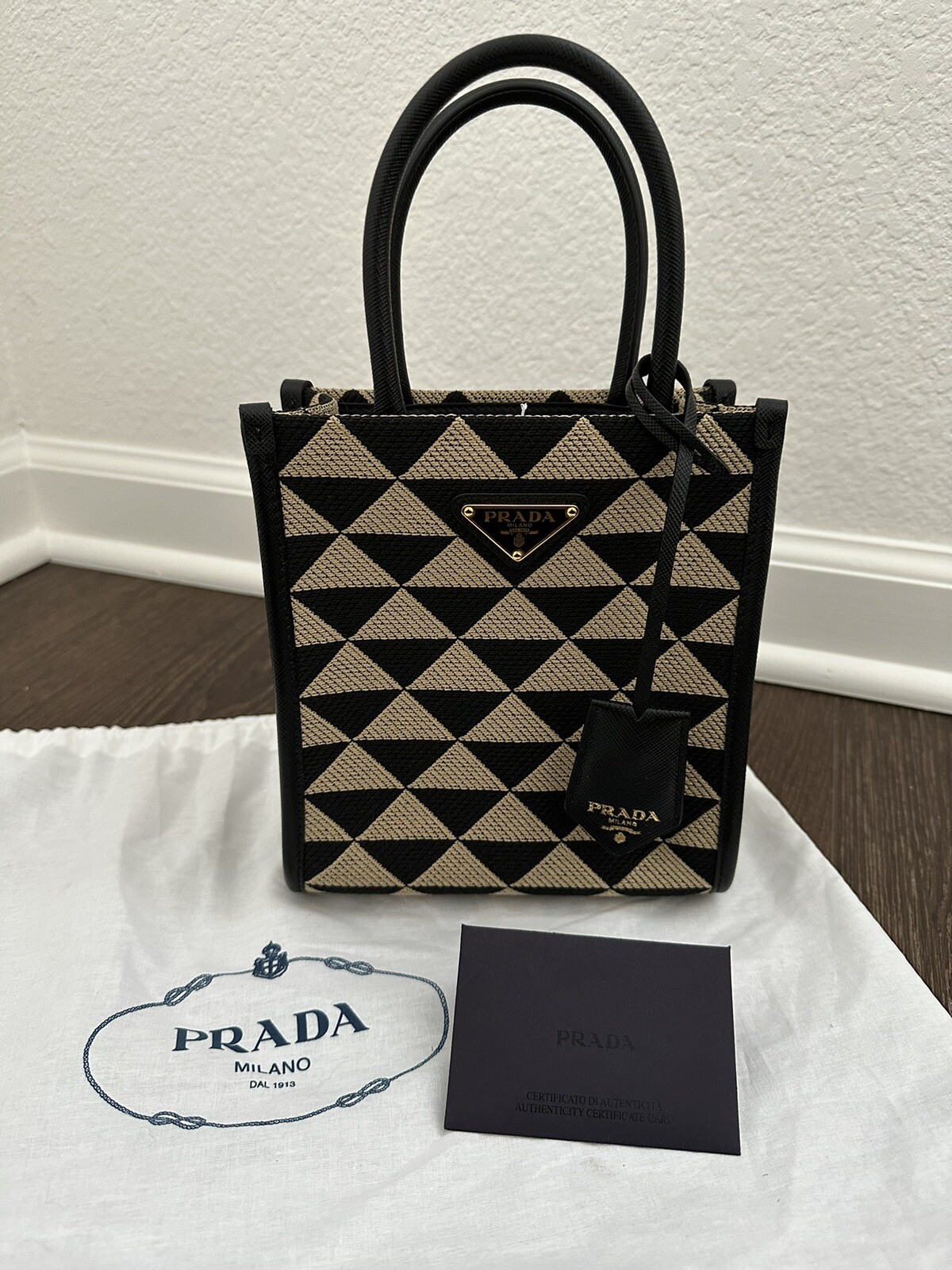 Prada Symbole embroidered black beige fabric mini bag