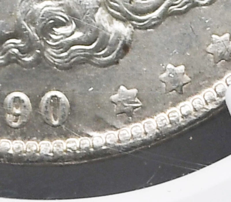 Un dólar de plata Morgan 1890 O $1 NGC MS62 cometa Nueva Orleans VAM 10A