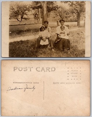 Native American Family Seated Outdoors Postcard