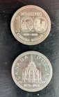 Pair of Canadian Commemorative .500 Silver Dollars - Barely Circulated