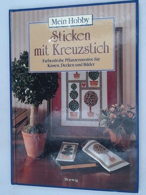 Sticken mit Kreuzstich: farbenfrohe Pflanzenmotive für Kissen, Decken und Bilder