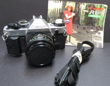 Canon AE-1P camera & 50mm 1.8 lens no squeal  tested very clean