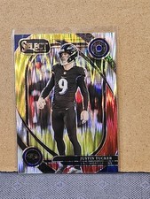 2024 Panini Select - Club Level Justin Tucker #274 Red & Yellow Shock Prizm