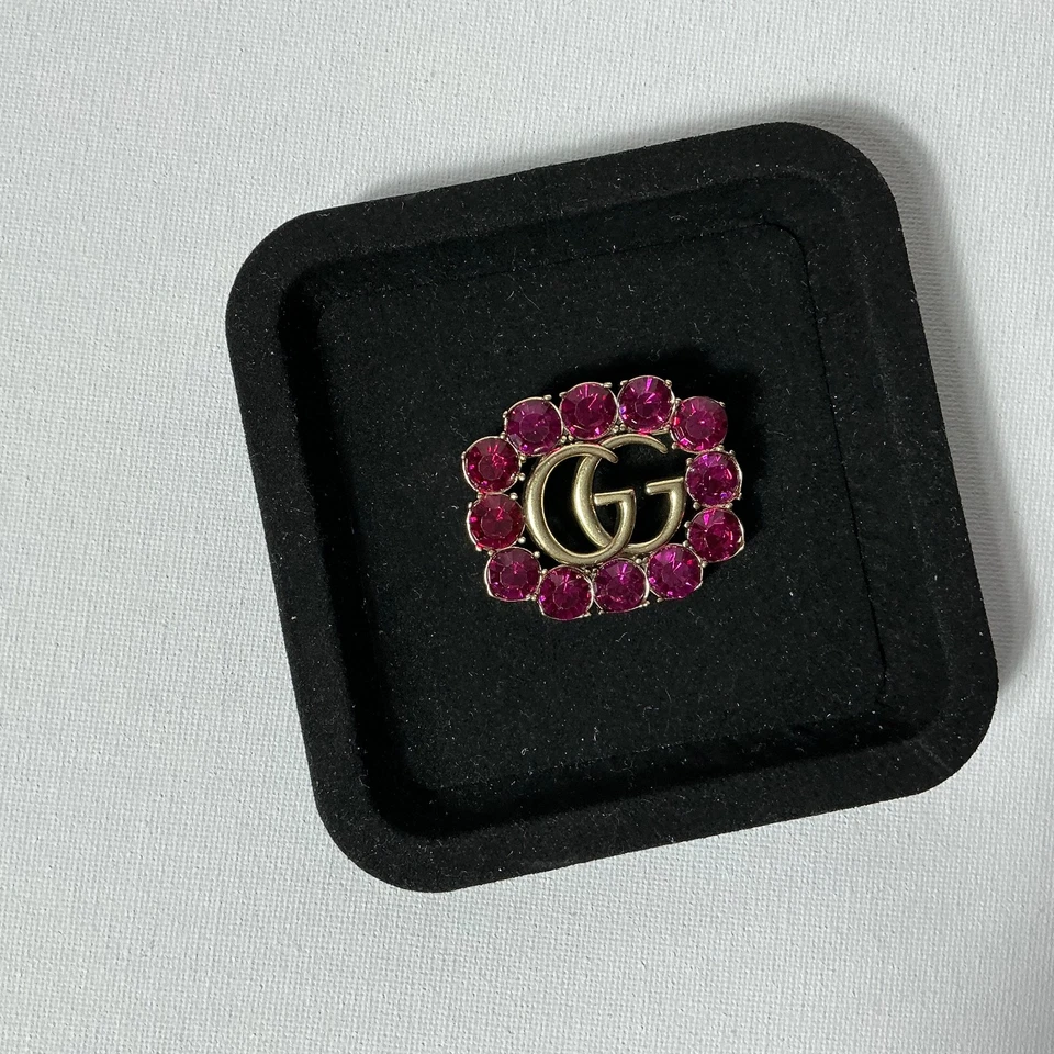 Broche Gucci GG dorado vintage Foto 3 de 4