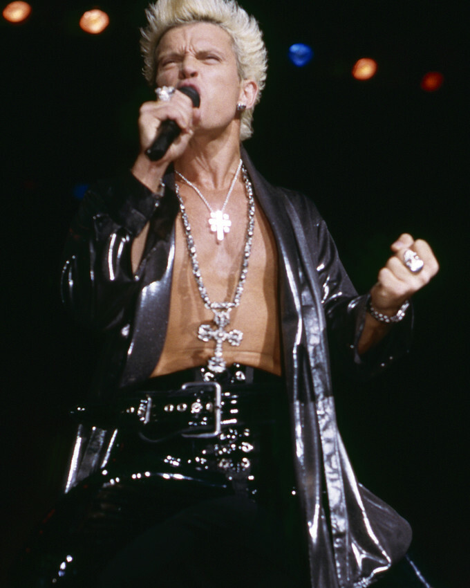 Billy Idol 1980's in concert wearing black open leather Billy Idol 1980's in concert wearing black open leather
