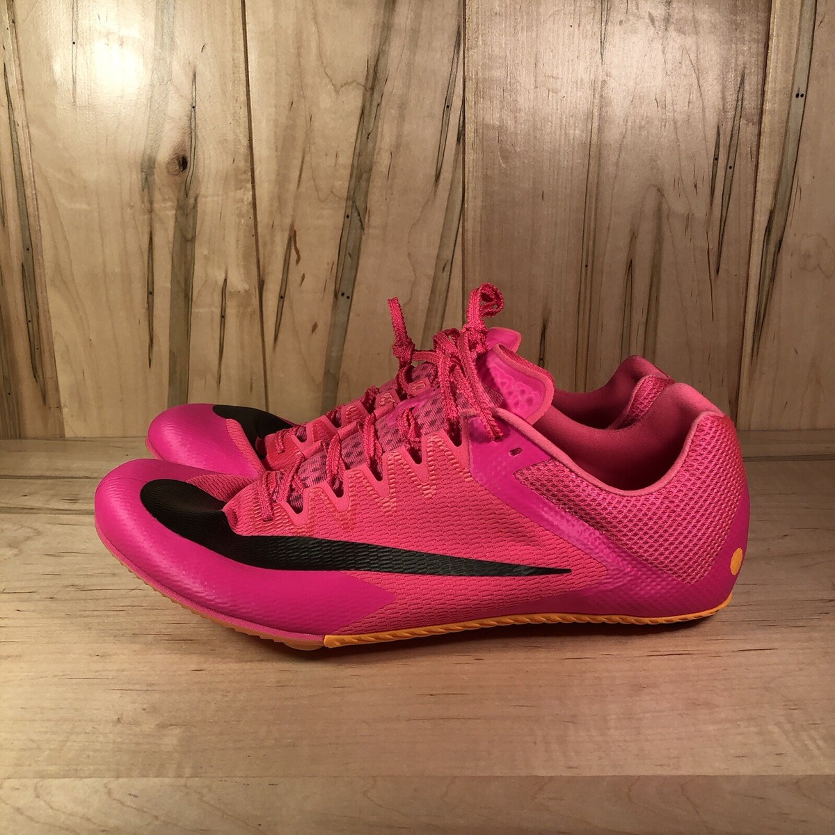 pink nike running spikes