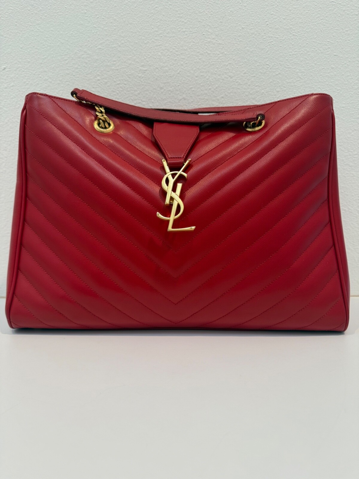 Borsa Cassandra YVES SAINT LAURENT rossa trapuntata pelle grana monogramma catena
