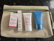 Clarins Gift Bag Set Of 4 Mascara Supra, Face Oil, SOS Hydra, Beauty Balm