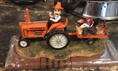 Oklahoma State Cowboys Pistol Pete mascot going to the market figurine rare new