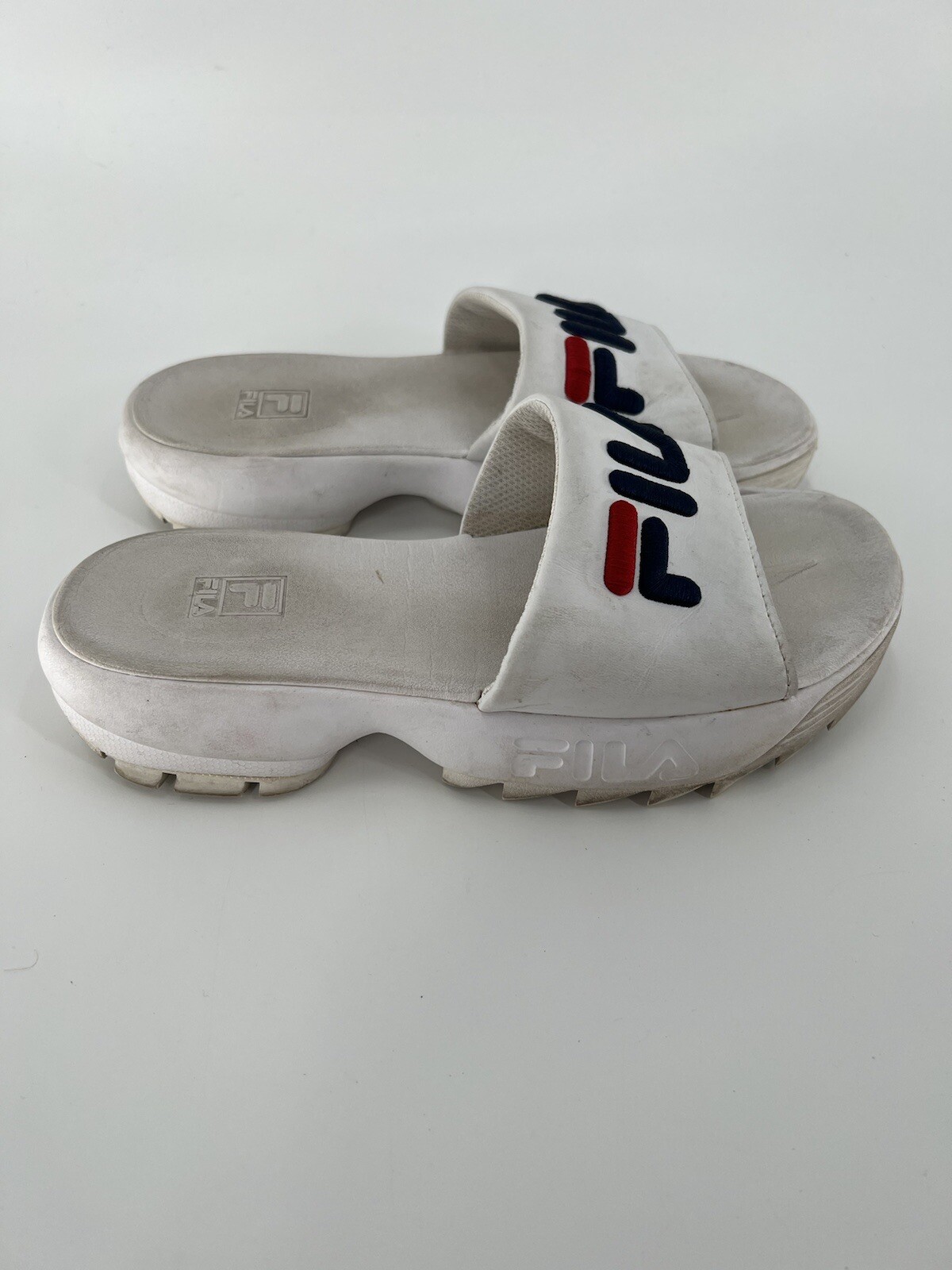 fila white flip flops