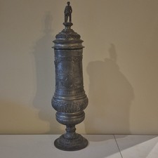 German Pewter Lidded Beer Stein w/ Soldier Figural Finial, Embossed City Scene
