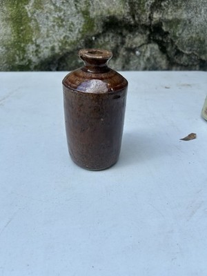 stoneware ink bottle, dark brown glazed