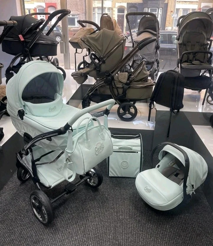 Floor Display Junama Pram System In Mint Green Was £1599 Now Only £899