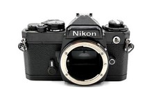 Black Nikon FE SLR film camera; Reburfished - Visible Wear - Good only