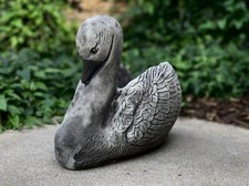 Large swan sculpture Elegant swan statue Unique swan figure Amazing garden