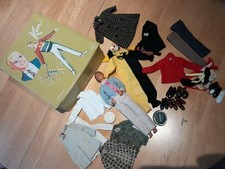 1963 KEN DOLL CASE AND MIXED YEARS CLOTHING/ACCESSORIES LOT