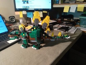 LEGO CREATOR STEGOSAURUS #4998 MISSING A FEW PARTS NO MANUAL SEE PICTURES