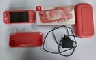 Nintendo Switch Lite Coral Pink - Including box, charger, and accessories