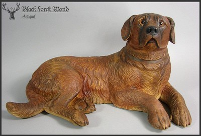 carved wooden dog