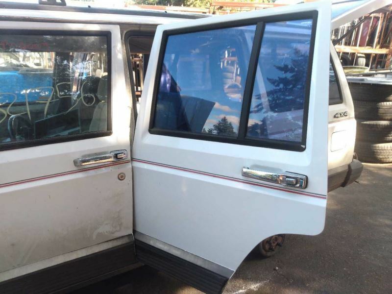 1993-1994 Jeep Cherokee Driver Left Rear White Door Complete