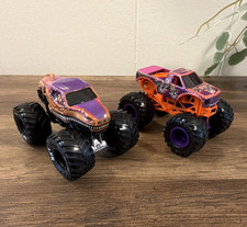 Monster Jam Monster Trucks Lot of 2 Purple Orange Velociraptor