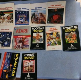 Atari 2600 System Bundle with Console, 24 Games, Joystick, Paddles, and More LOT