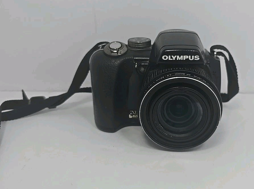 OLYMPUS SP-565UZ Digital Camera with Pro Master Case & Accessories