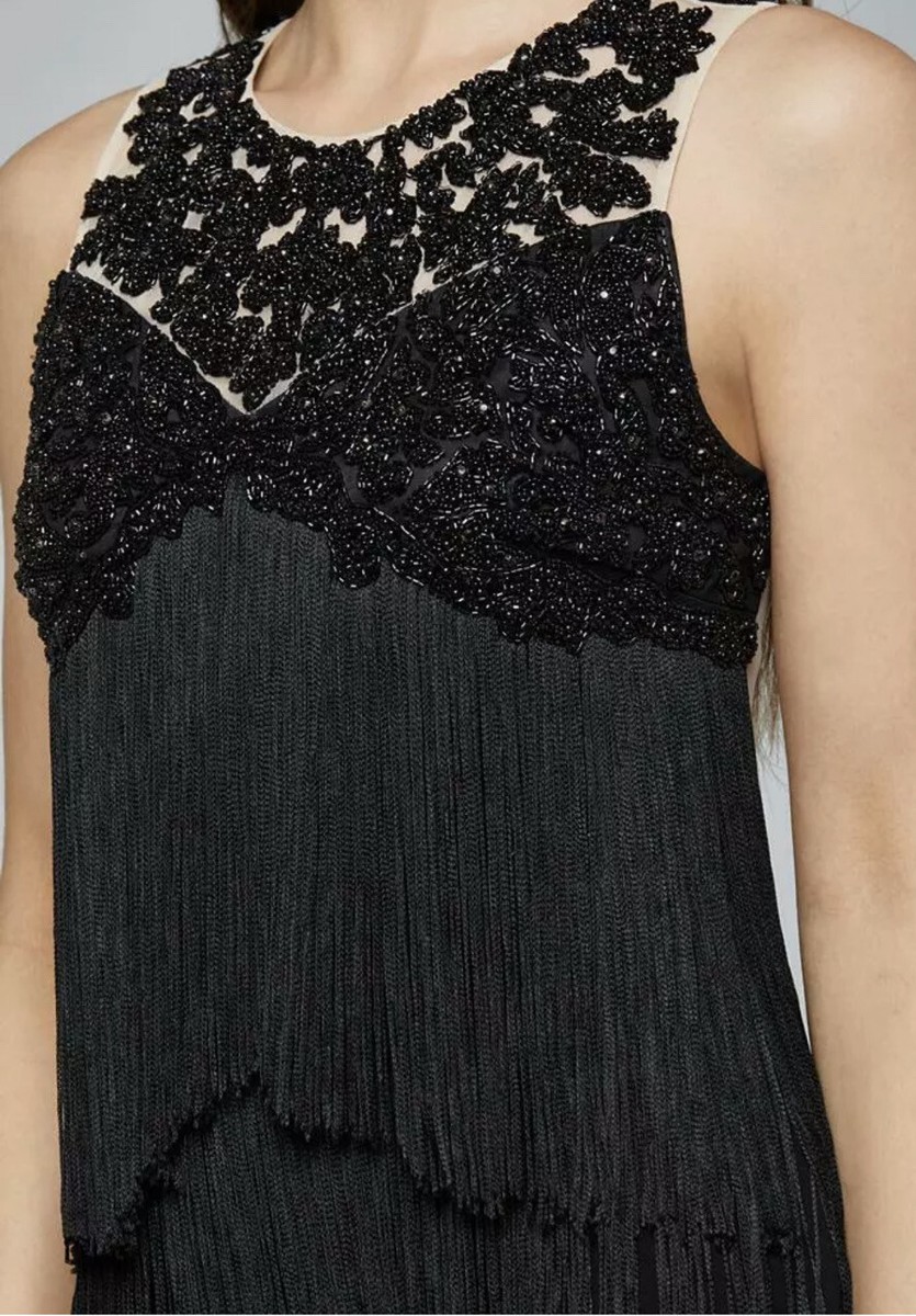 100 % AUTHENTIC NWT BEBE FRINGE DETAIL JEWELRY INST SURPLC ROMPER