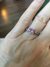 pink zirconia ring with side stones size7