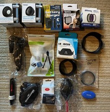 Lot of 17 New Camera Accessories Lens Hoods Filters Battery Charger Light Tripod