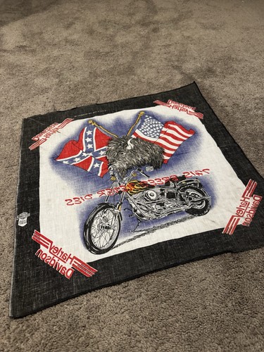 Black vintage Harley Davidson bandana with graphic of rider, American flag, and red-white “Breed Never Dies” text.