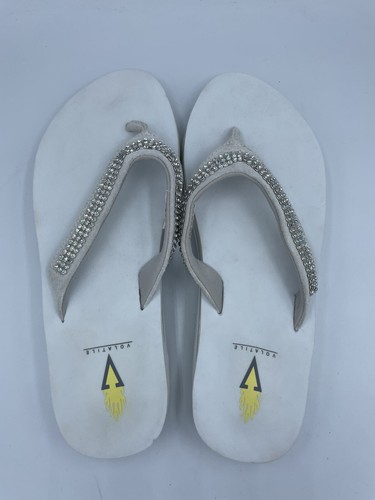 white volatile sandals