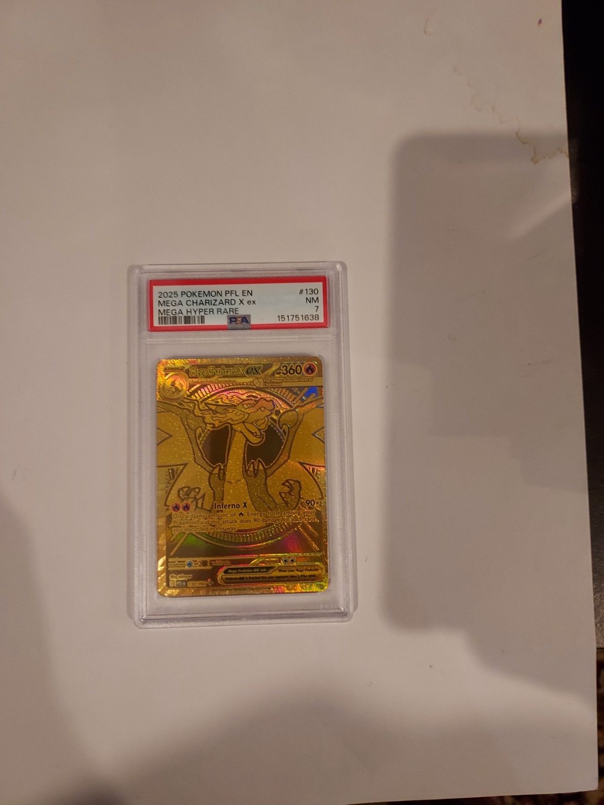 2025 Pokémon phantasmal flames mega charizard X ex #130 card graded psa nm7. view 2