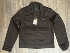 Brown canvas FILSON women’s jacket with collar, front buttons, and two flap chest pockets, made in USA RARE BAG.