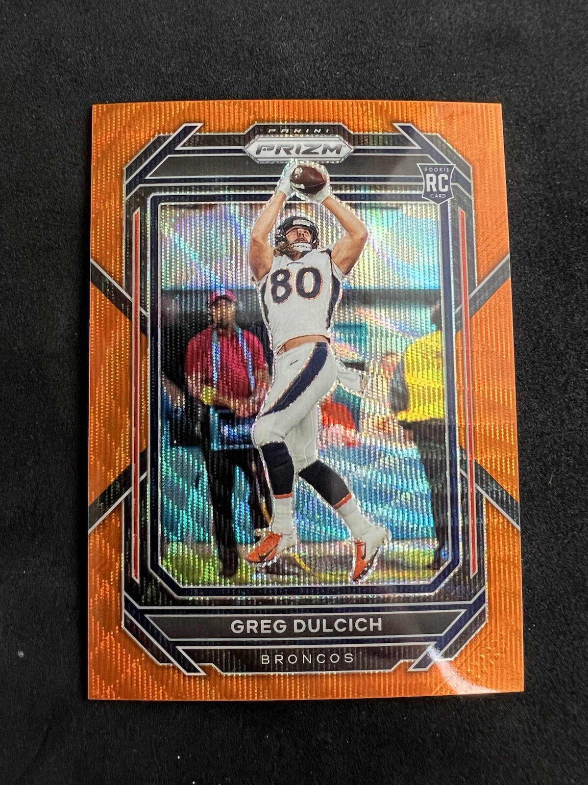 2022 Panini Prizm #360 Greg Dulcich Orange Wave #'d /60 Rookie Card Broncos RC