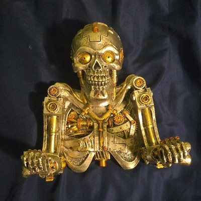 Ebros Gift steampunk robotic skeleton toilet paper holder.