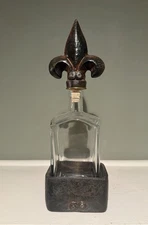 Jan Barboglio Heavy Cast Iron Fleur De Lis Stopper Glass Decanter With Coaster