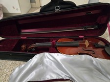 Used 14" Viola, Includes Bow, Sheet Music Stand And Used Rosin. Orig Price: 595