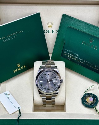 Rolex Steel Datejust 41-Smooth Bezel - Slate Green Roman Dial - Oyster Bracelet.
