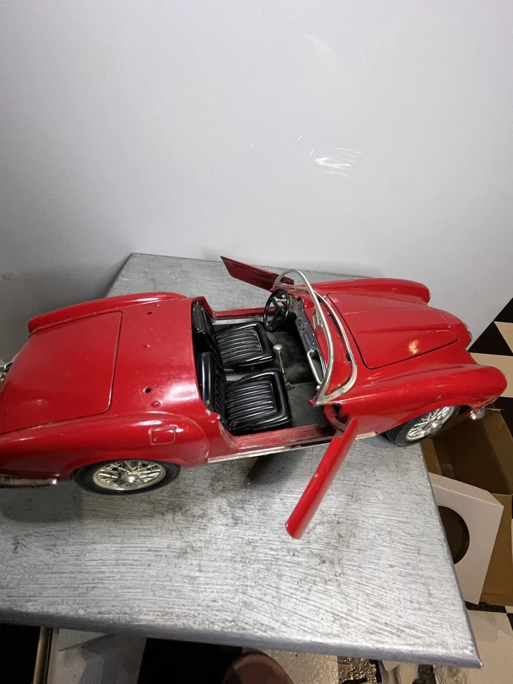 Coche diecast Bburago 1955 Lancia Aurelia Italia B24 Spider convertible escala 1:18. Foto 4 de 4