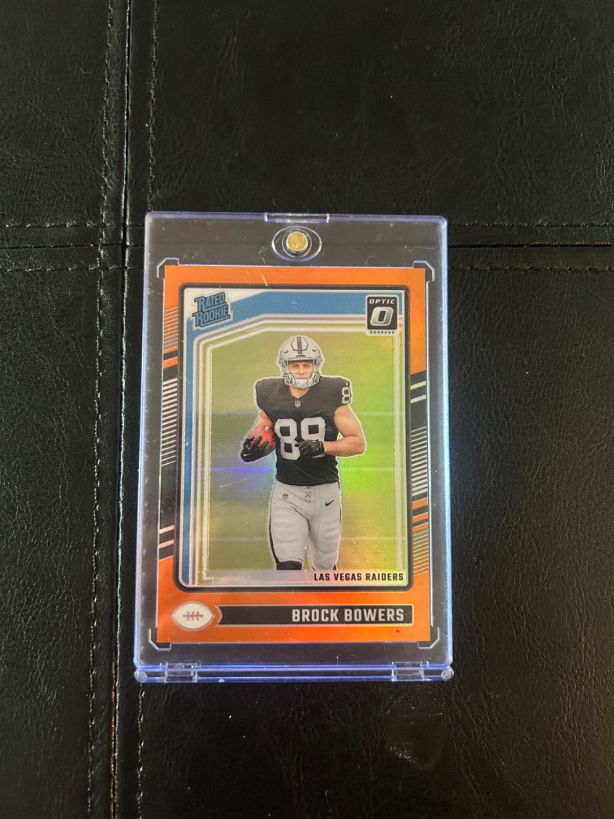 2024 Panini Optic - Rated Rookie Brock Bowers #215 Orange Prizm /249 (RC)