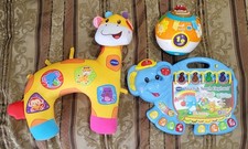 VTech Touch  Teach Elephant, Tummy Time Discovery Pillow, and Move  Crawl Ball