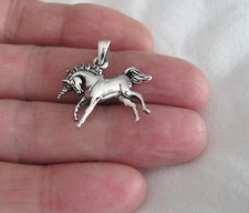 Sterling Silver 21mm Unicorn pendant.