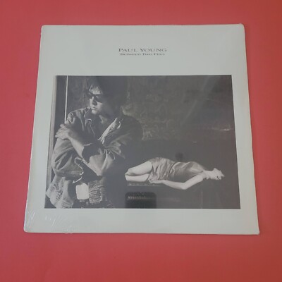 PAUL YOUNG Between Two Fires Sealed LP