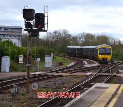 PHOTO  166211 EXETER ST DAVIDS  166211 COASTS DOWN THE HILL INTO EXETER ST DAVID