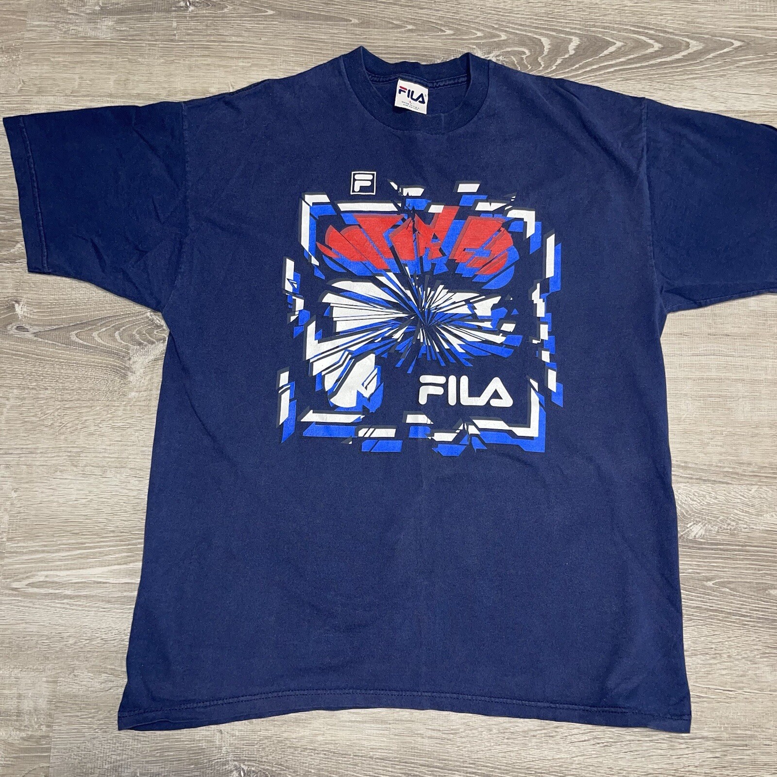 T shirt uomo blu grande vintage anni 90 FILA Spell Out F grafica made in USA