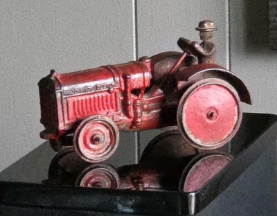  RARE, RED, ARCADE, 7-INCH Cast Iron MCCORMICK-DEERING  TRACTOR. Very Nice.