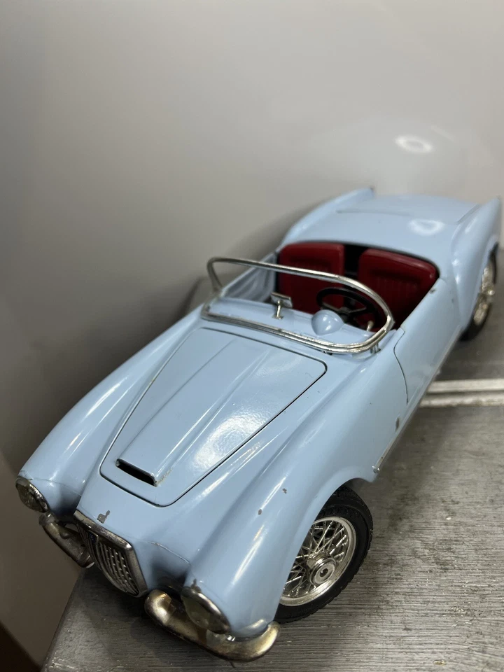 Coche diecast Bburago 1955 Lancia Aurelia Italia B24 Spider convertible escala 1:18 Foto 2 de 4